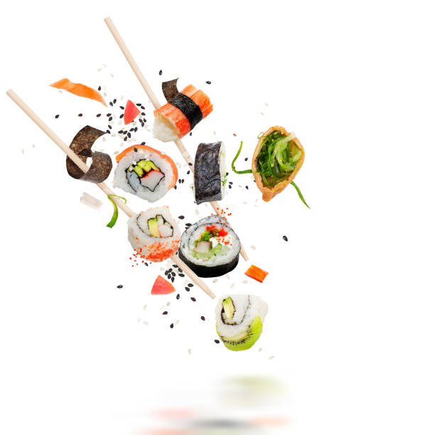 istock sushi rolls with wooden chopsticks on white background 1161287936