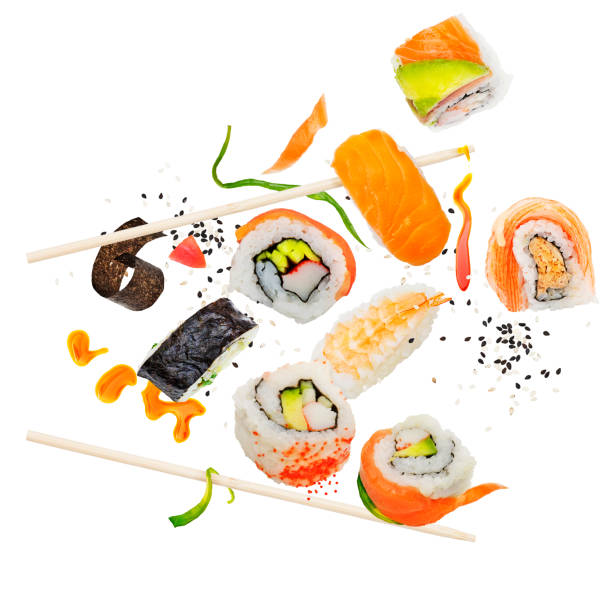 istock sushi rolls with wooden chopsticks on white background 1161287967