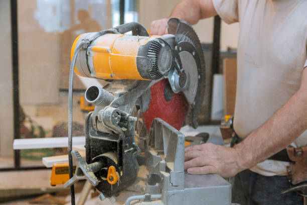 istock Circular saw cutting new baseboard for renovation home 1161289582