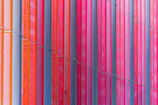 Abstract view of a building with colorful LED light reflection