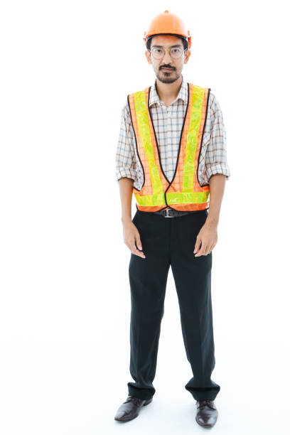 istock Engineer man standing orange helmet and vest 1161300695