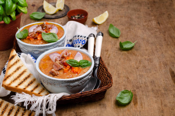istock Thick soup with lentils, slices of meat and vegetables 1161302520