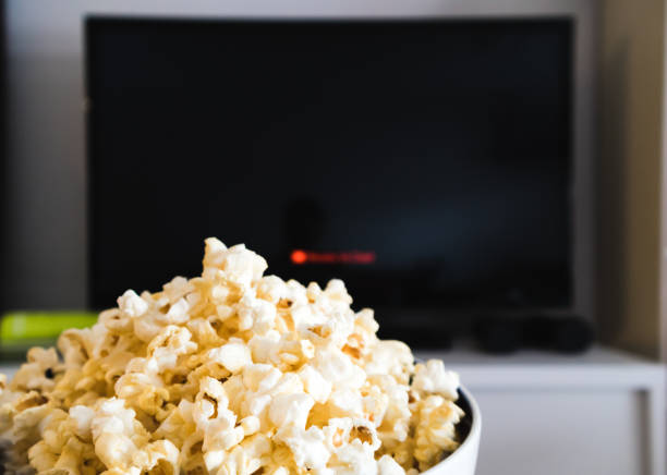 istock Black screen Smart TV and Popcorn bowl. 1161304652