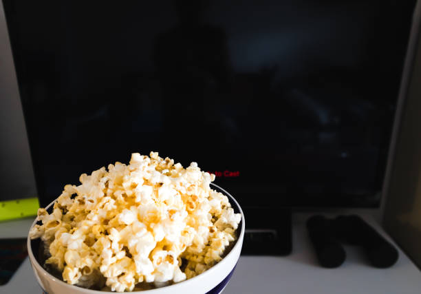 istock Popcorn bowl and blank Smart TV 1161304656