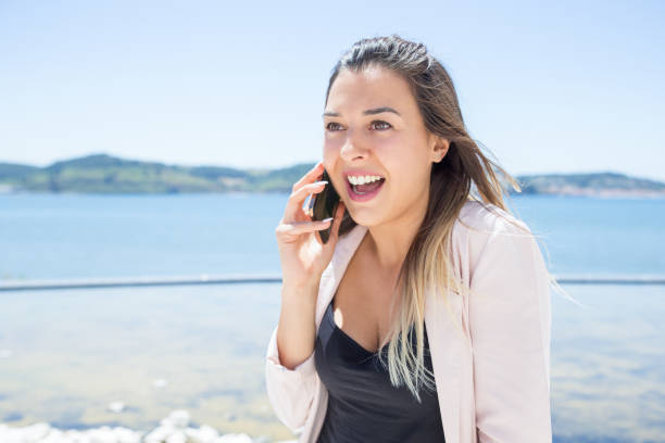 istock Joyful surprised lady excited with phone call 1161304788