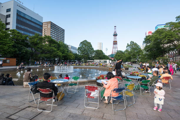 Sapporo, Japan - June 6, 2019: People have a rest in Odori park