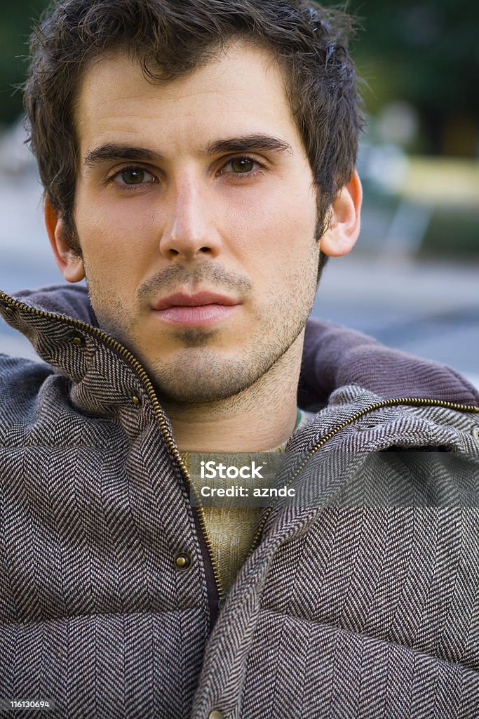 Pensive Handsome young man, shallow depth of field with selective focus on th eyes. 20-24 Years Stock Photo