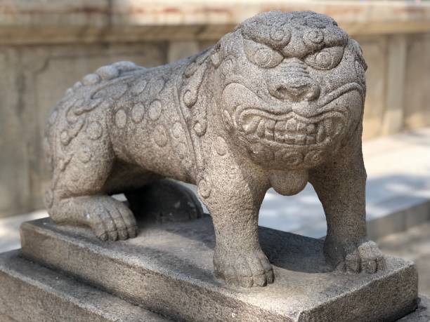 istock Lion statue outside a Buddhist temple 1161309865