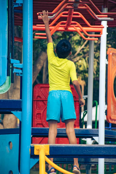 istock Indian boy playing in outdoor park 1161316681