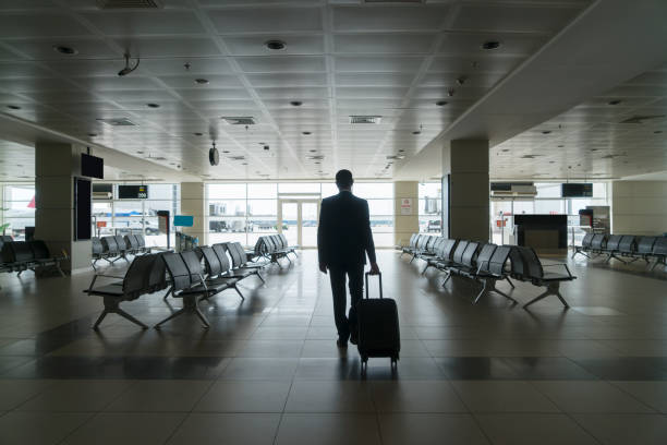 istock Businessman in airport 1161317438