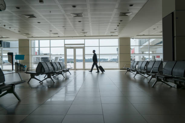 istock Businessman in airport 1161317537