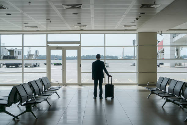 istock Businessman in airport 1161317560