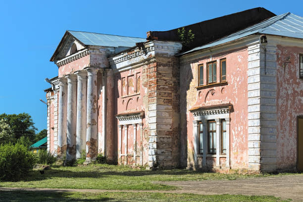 Manor house of Sergey Tatishchev in Staraya Vichuga settlement, Ivanovo Oblast, Russia Staraya Vichuga, Russia - June 13, 2019: Manor house of the Russian lieutenant general Sergey Tatishchev (1771-1844). The mansion was built in 1820s. Nowadays it is practically abandoned. ivanovo oblast photos stock pictures, royalty-free photos & images