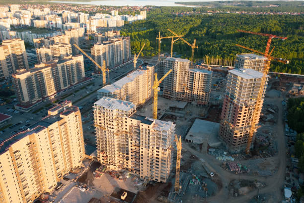 Aerial view; drone view of construction site near the forest stock photo