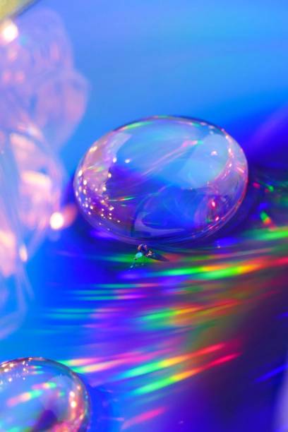istock Drop macro background.Water drop on a iridescent background with gradation and highlights. .Phone wallpaper 1161319953