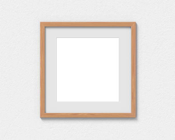 istock Square wooden frames mockup with a border hanging on the wall. Empty base for picture or text. 3D rendering. 1161325561
