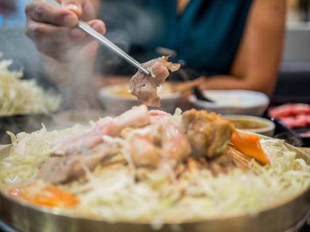 istock Close up pork cooked on a hot plate, happy meal 1161327569