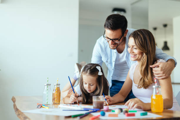 istock Happy family having fun time at home 1161328914
