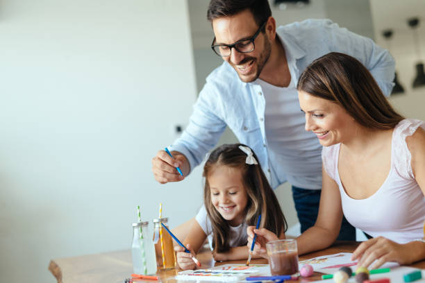 istock Happy family having fun time at home 1161328916
