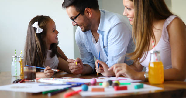 istock Happy familiy spending fun time at home 1161329513