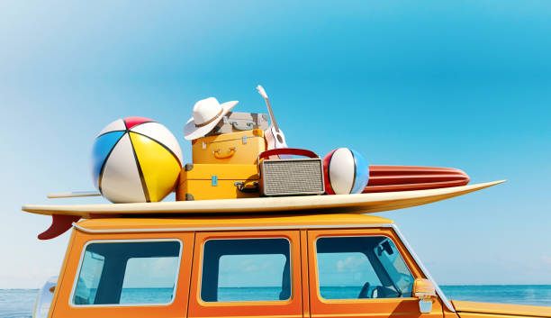 Big retro car SUV with baggage, luggage and beach equipment on the roof, fully packed, ready for summer vacation, concept of a road trip with family and friends, 3d rendering stock photo