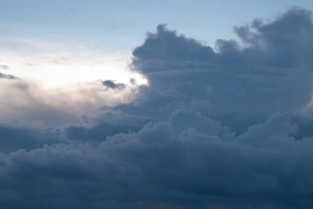 istock beautiful clouds at sunset, dark Cumulus clouds, 1161334973