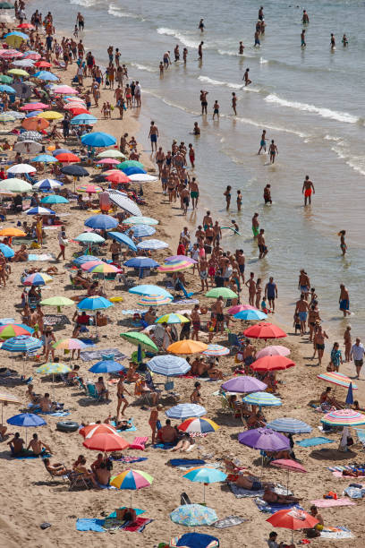 istock Mediterranean coastline in Spain. Calpe beach. Summer crowd. Alicante 1161336355