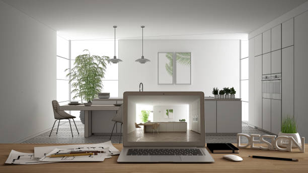 istock Architect designer desktop concept, laptop on wooden work desk with screen showing interior design project, blueprint draft background, modern white kitchen with wooden details 1161346495