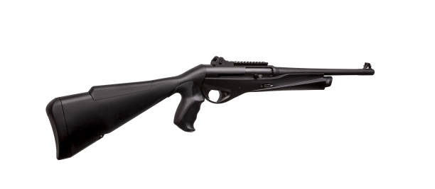 istock Modern black shotgun isolate on white background. Black semi-automatic shotgun on a light background. 1161346710