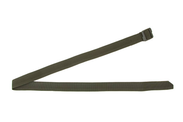 cintura di fissaggio in nylon verde, cinturino isolato su sfondo bianco. - belt strap guitar isolated foto e immagini stock