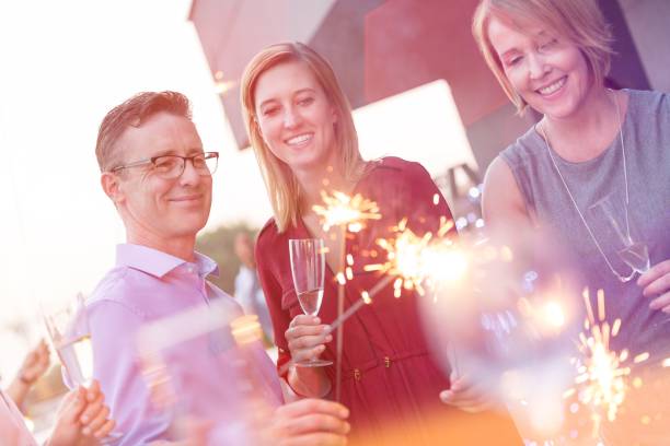 istock Business people on a rooftop party. 1161346833