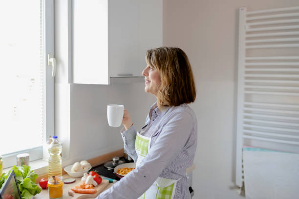 istock Woman Having a Cup of Coffee 1161346961