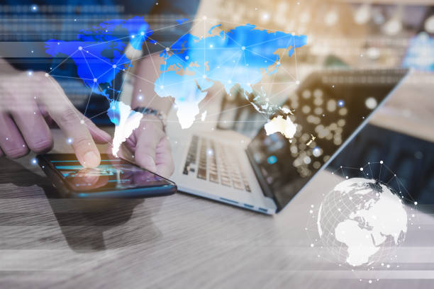 istock Globalization conceptual of technology use laptop and smartphone, wireless internet connection every where 1161347639
