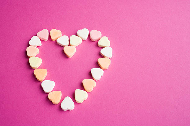 istock multicolored candy hearts arranged in the shape of a heart 116134771