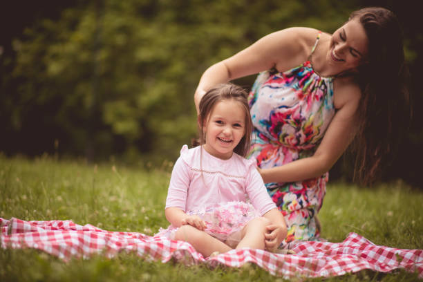 istock I love when my mother making me hairstyle. 1161348880