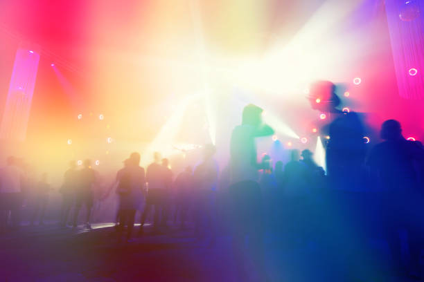 Abstract background of dancefloor with moving people