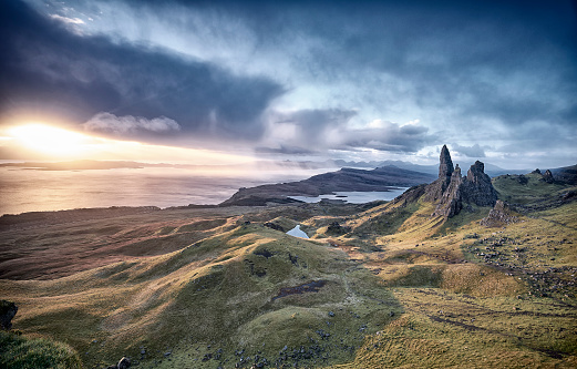 View Over Old Man Of Storr, Isle Of Skye, Scotland. During a beautiful sunrise and dramatic sky with a local shower here and there.