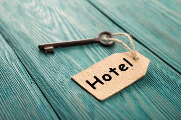istock hotel key with tag on the wooden background 1161350183