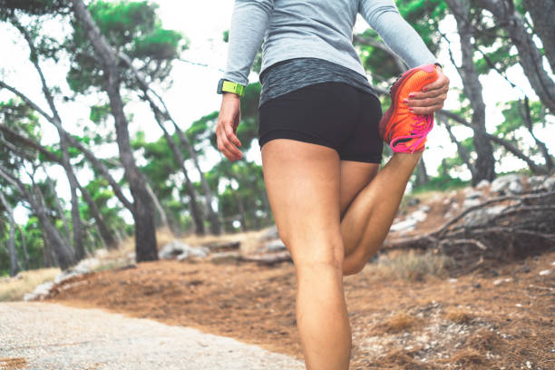 istock Woman stretching her legs 1161350248