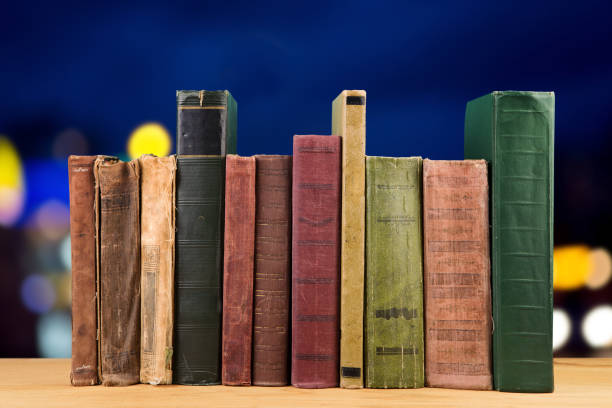istock stack of books over the natural background 1161350599