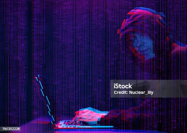 Guy Hacking/computer Hacker Working With Laptop In Dark Room With Digital Interface Around ...