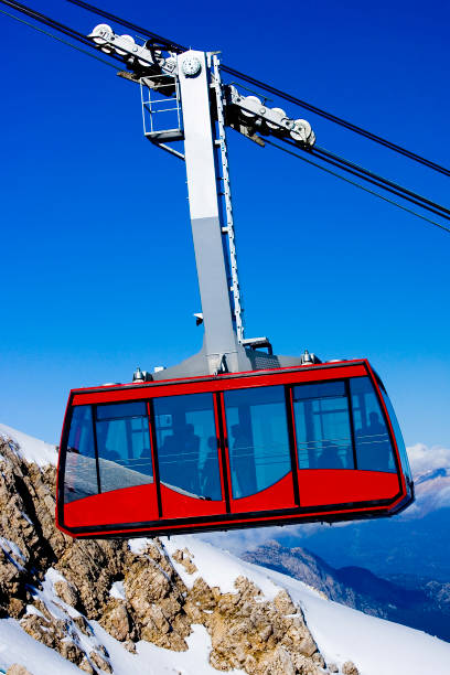 istock Cable cars carry skiers 1161353295