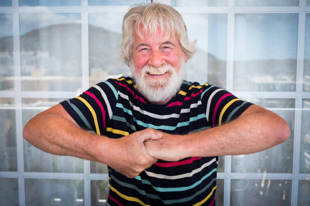 Smiling People Senior Man White Beard And Hair Gesturing With Hands One  People With Blue Eyes And Large Smile Striped Tshirt Colorful Stock Photo -  Download Image Now - iStock