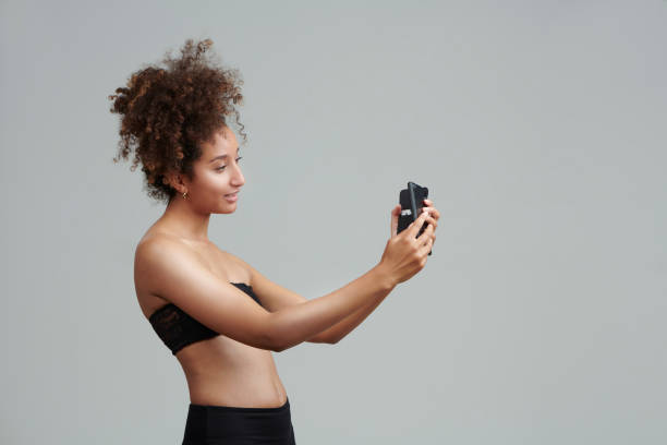 istock Mixed race woman taking selfie 1161355957