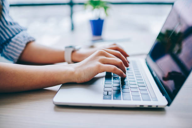 istock Cropped image of female hands typing on laptop computer connected to wifi working on freelance ,keyboarding on modern netbook for searching information online in networks for online business 1161358831