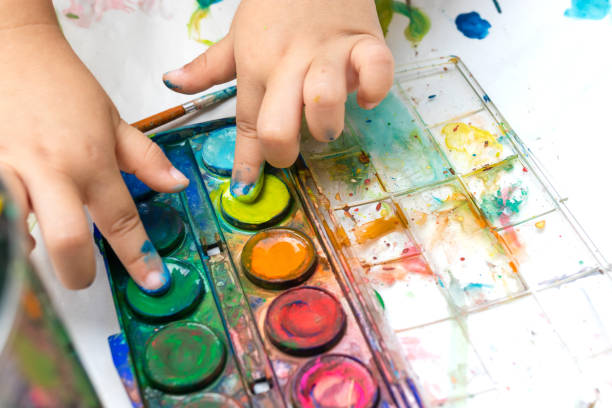 istock Child paint with watercolors. Education concept. 1161360920