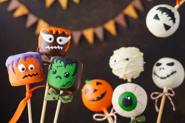 istock Halloween cake pops and marshmallow with funny monster faces. 1161362687