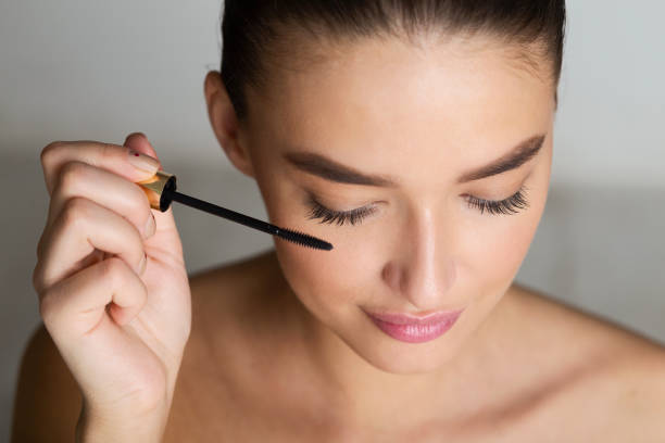 istock Doing Makeup. Woman Applying Mascara on Eyelashes 1161364177