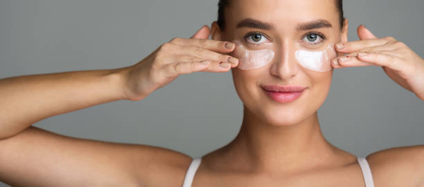 istock Woman with Collagen Pads under her Eyes 1161365335