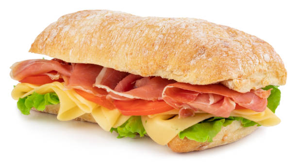istock Ciabatta sandwich with lettuce, tomatoes prosciutto and cheese isolated on white background 1161366517